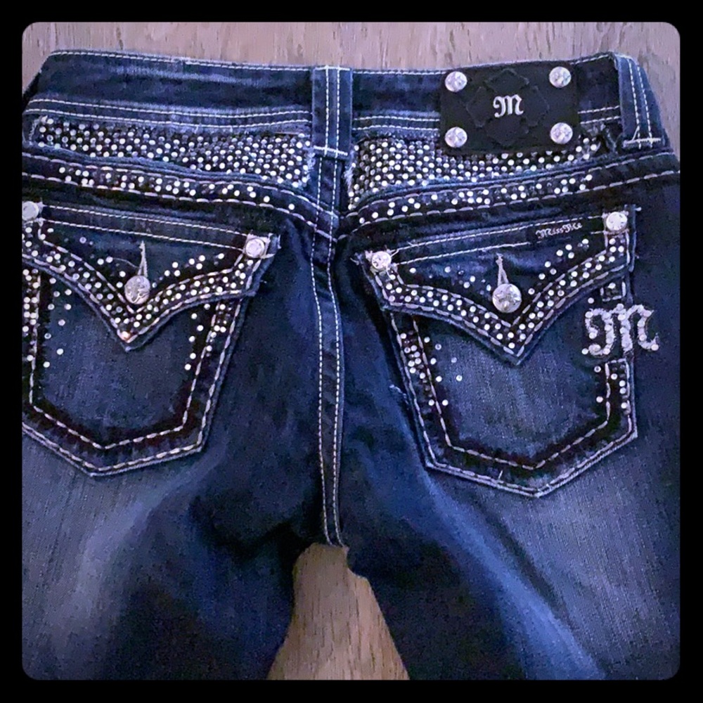 Blinged out barely worn miss me jeans.